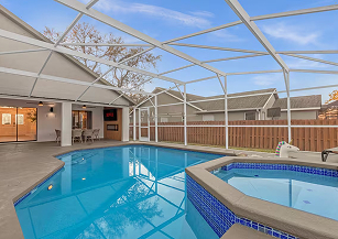 Swimming pool area with palm trees