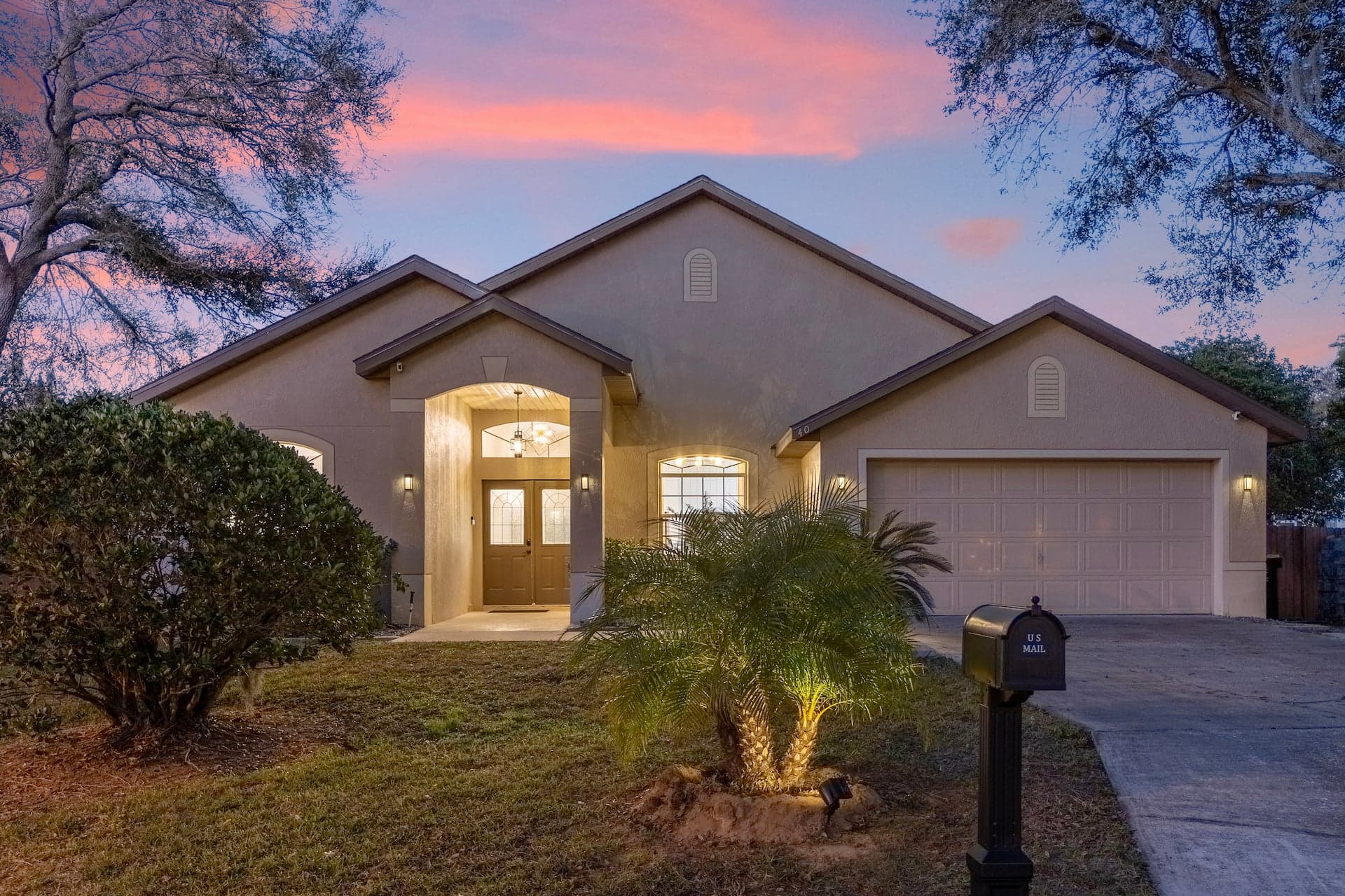 Luxury real estate exterior with sunset view